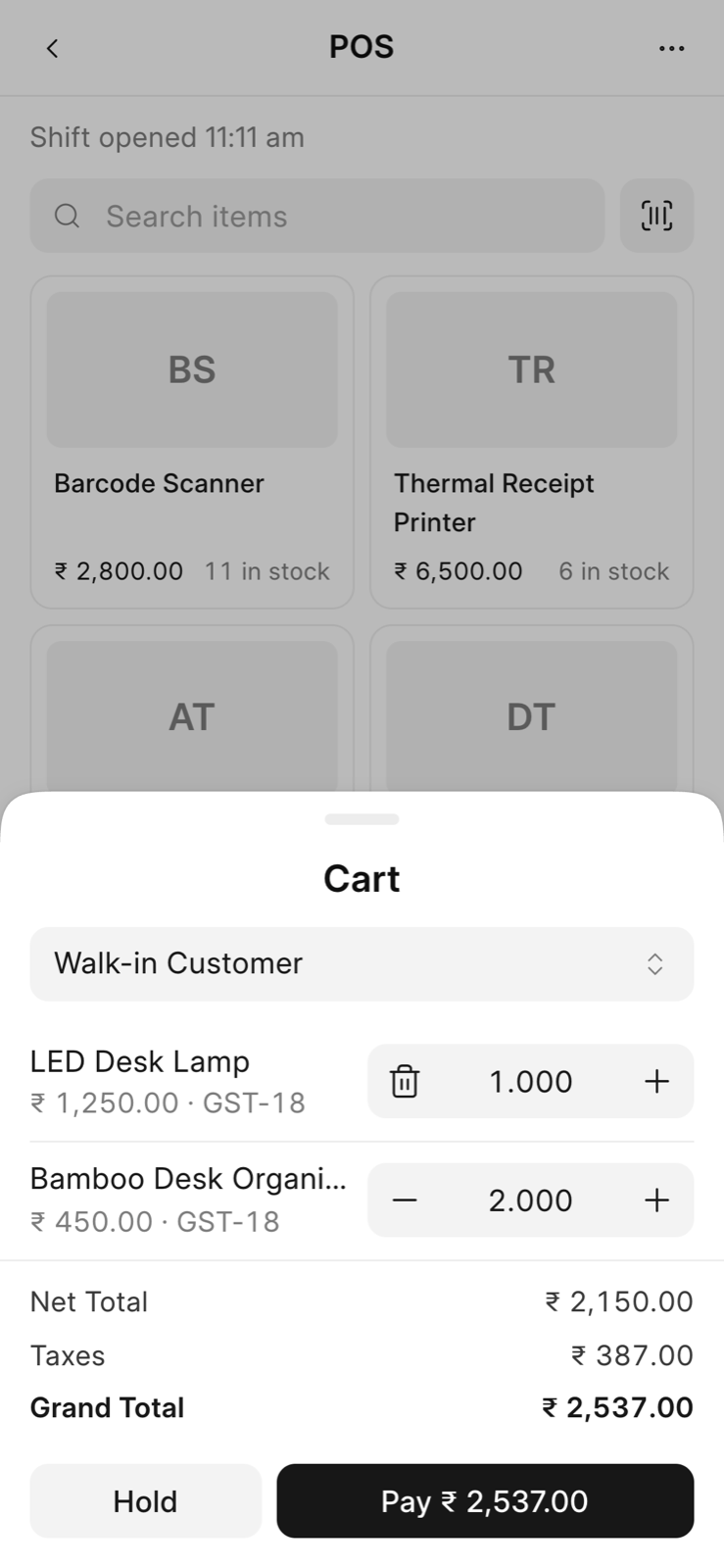 Phone POS cart sheet with two items, the totals, Hold, and Pay.